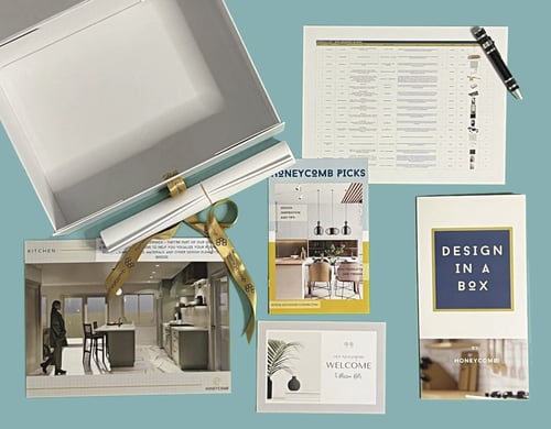 Flat lay of the “Design in a Box” package by Honeycomb in the San Diego area, featuring inspiration cards, design picks, checklist, and a welcome note